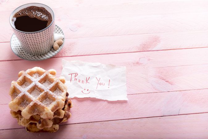 Cup of coffee and thank you note