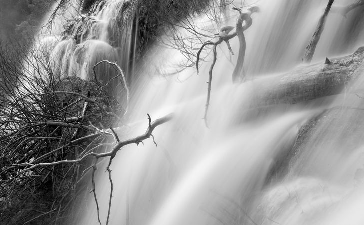 Wonderful waterfall near tree