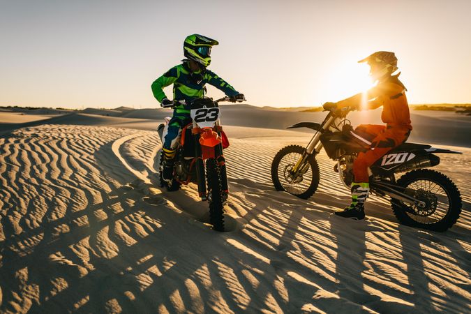 Riders practising off roading in desert