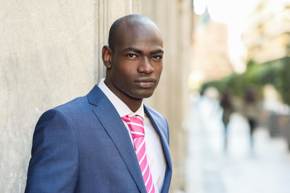 Picture of male looking at camera while wearing business attire