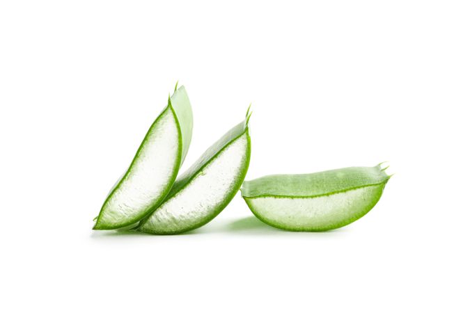 Aloe vera slices isolated on studio background. Herbal medicine
