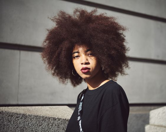 London, England, United Kingdom - September 15th, 2019: Portrait of woman with afro