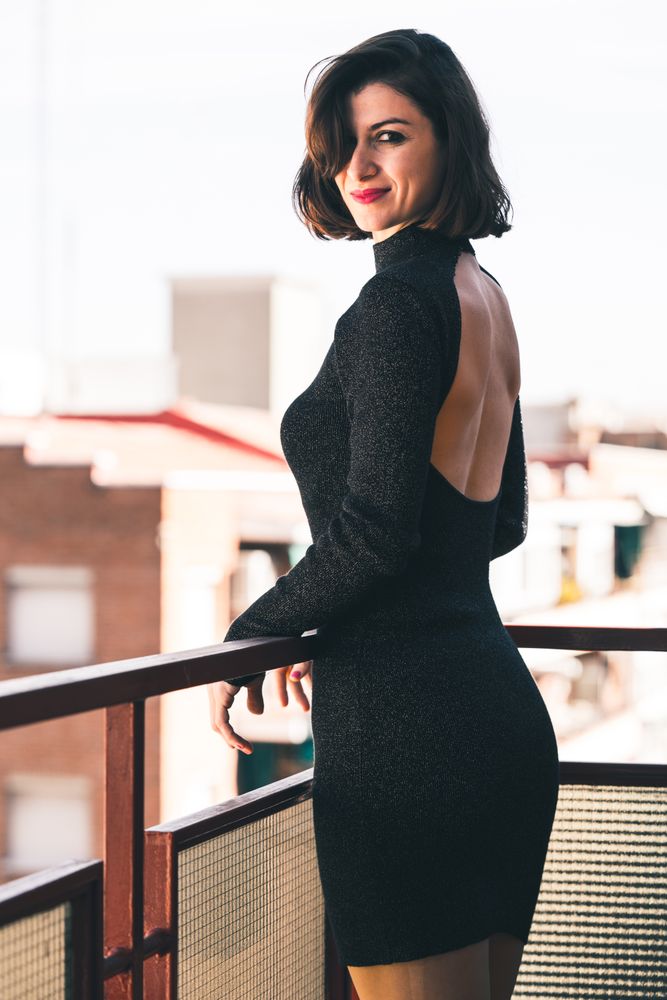 elegant woman on balcony
