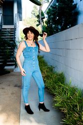 Transgender woman smiling in a candid moment outside