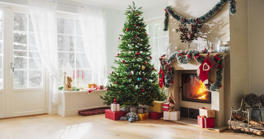Peaceful Snowy Christmas Morning: Decorated Corner in Modern House with Christmas Tree, Fireplace and Gifts.