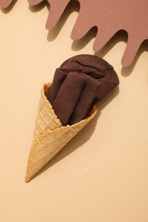 Concept of clothes for legs - socks, creative composition with socks like ice cream