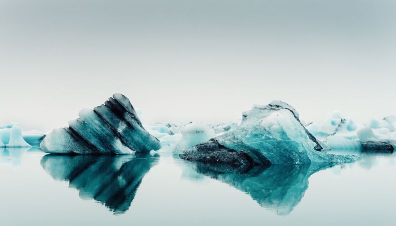 Ice on water between snow