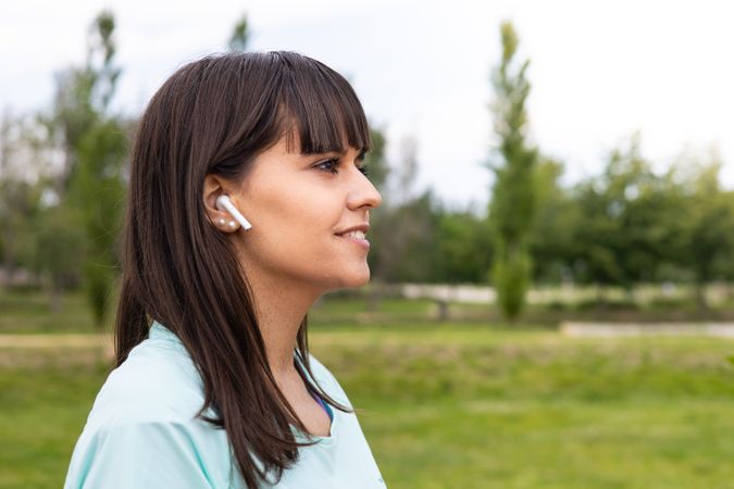 Runner woman relaxed listening to music for training outdoors