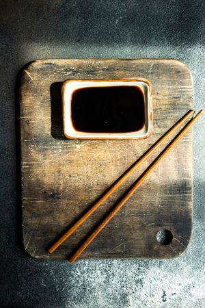 Asian table setting with chopsticks and soy sauce