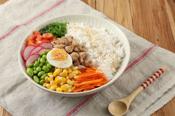 Hawaiian Ahi Chicken Poke Bowl Salad with Edamame, Corn, Tomato, Carrot, and Steamed Egg