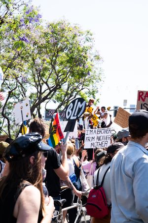 Los Angeles, CA, USA — June 14th, 2020: group of people holding protest signs in Hollywood