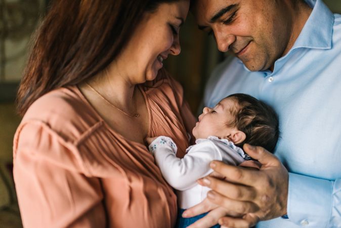 Happy family with newborn baby