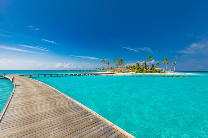 Overwater bridges leading to a tropical beach