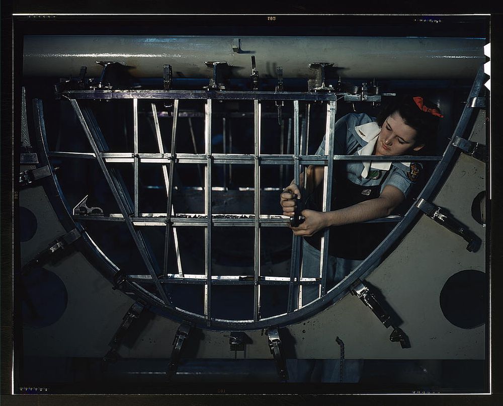 Fort Worth, TX, USA - 1942: Female a mechanic at a western aircraft plant