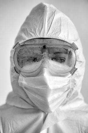 Grayscale photo of healthcare worker in PPE