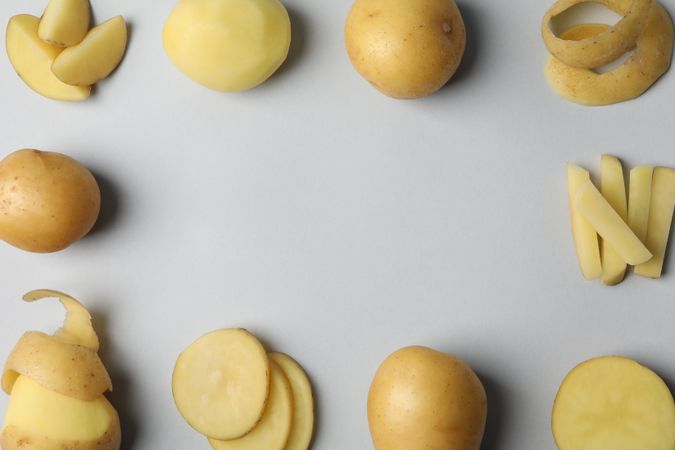 Potatoes cut in different ways in square shape, close up with copy space