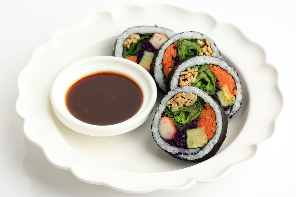 Gimbap or Kimbap, Korean Food Made from Cooked Rice with Vegetables, Egg, Meat