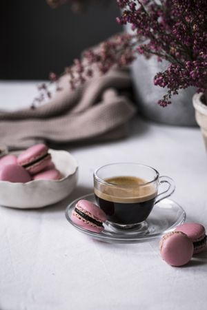 Cup of espresso with macaroons