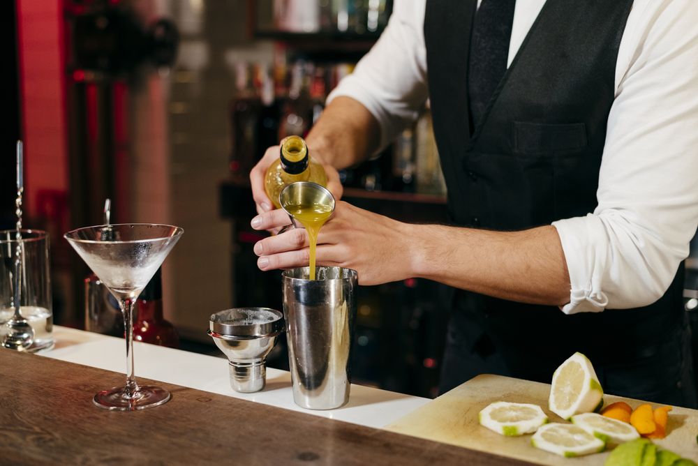 Barman working making drinks