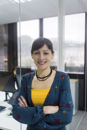 Confident businesswoman standing in office