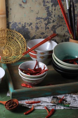 Collection of Chinese Bowl and Spoon with Rustic Background and Sun Dried Chilli