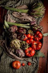 Assorted vegetables and napkins on table