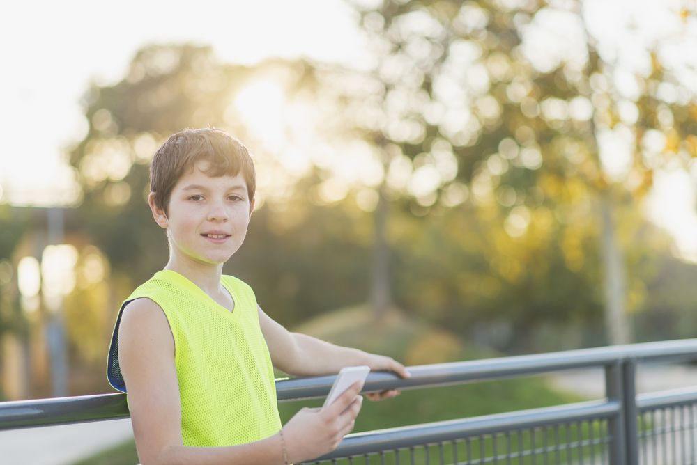 Portrait of a teenager smiling looking at camera