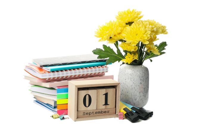 1 september wooden calendar and school supplies isolated on blank background
