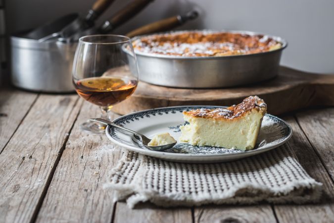 Cottage cheese pudding and glass of cognac