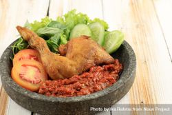 Bowl of chicken Indonesian dish served with sambal paste 5l9Ya4
