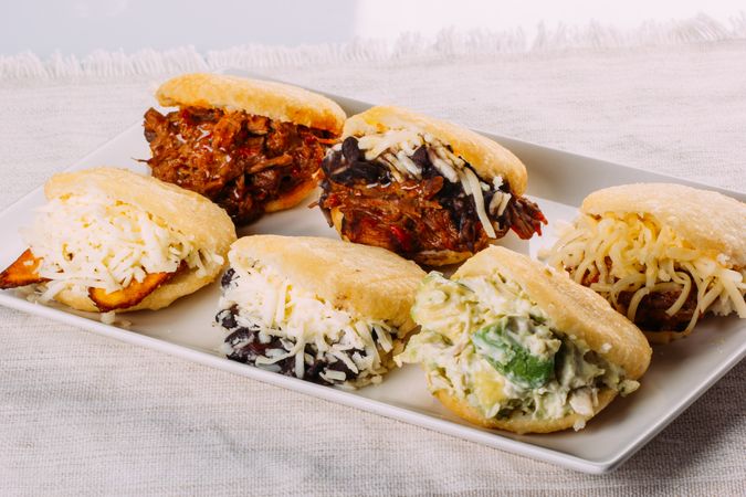 Latin American breakfast, specifically in countries such as Venezuela and Colombia, Arepas with several ingredients to fill like chicken, meat, avocado, cheese