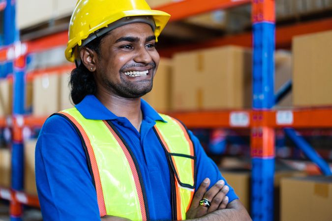 Smiling employee in the warehouse