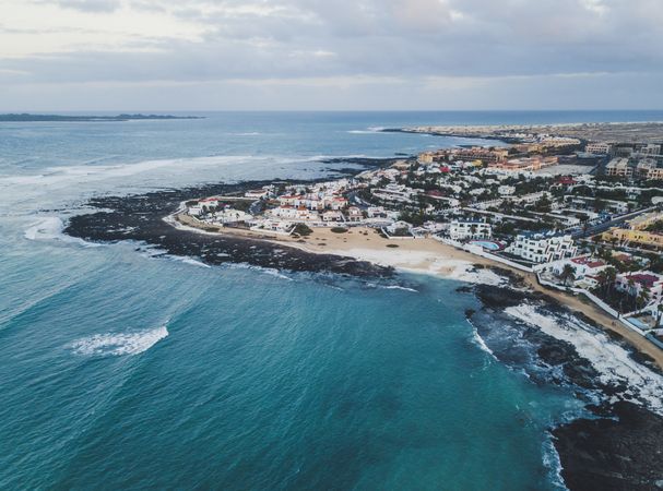 Scenic aerial view of city on ocean shore