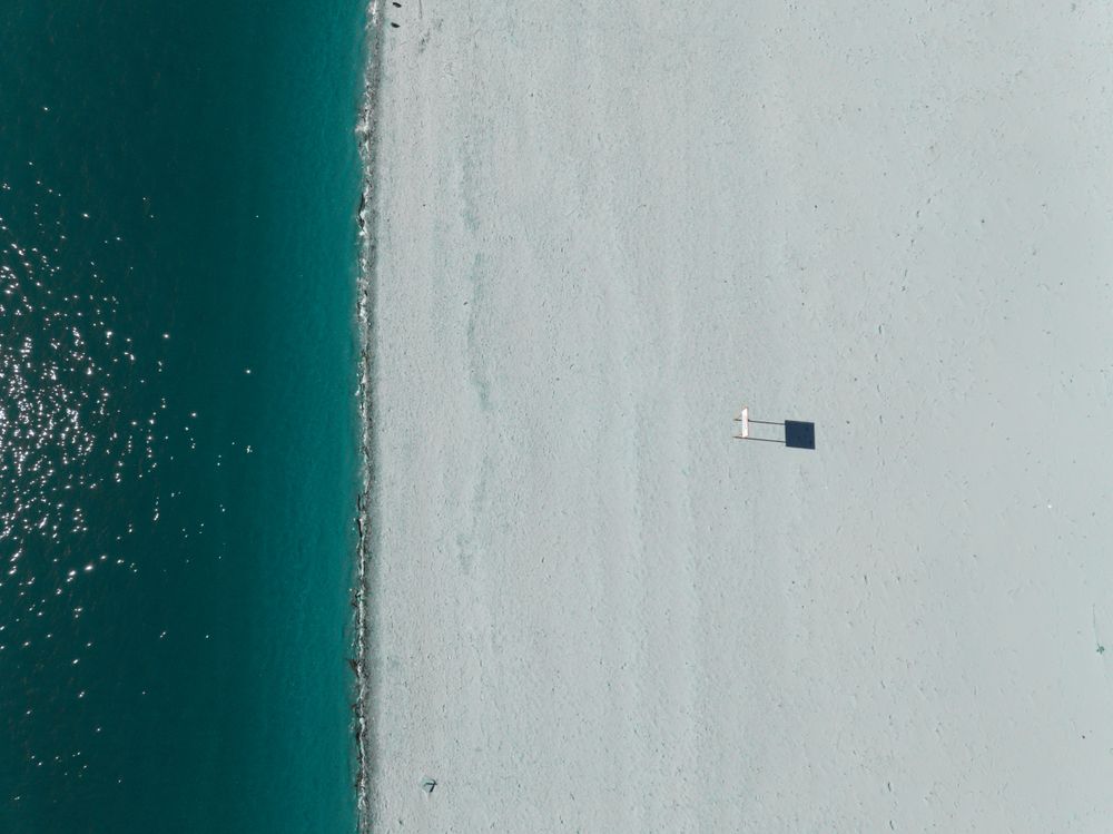 Aerial abstract photo of a blue summer beach