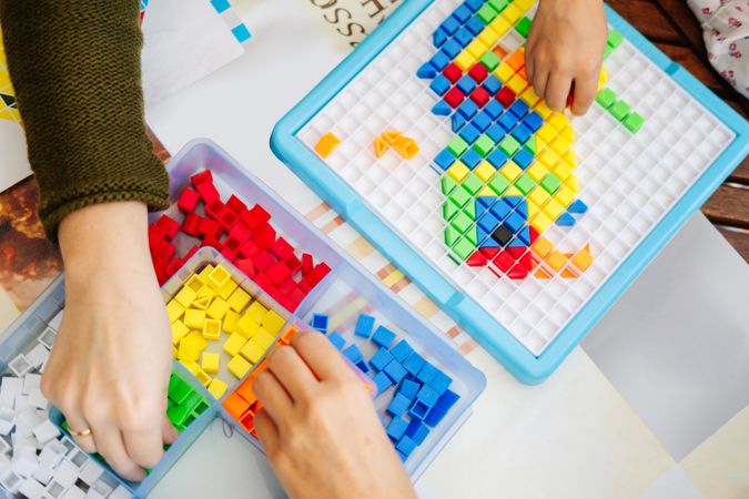 Box with colorful pieces for board game