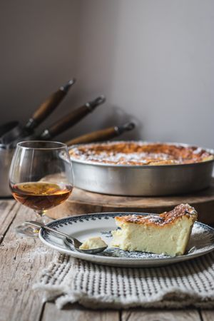 Cottage cheese pudding and glass of cognac