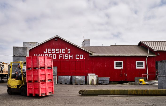 The red building by the pier of Jesse's Fish Co, in Ilwako, Washington