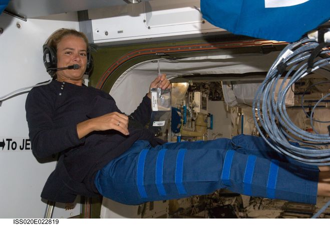 Canadian Space Agency astronaut Julie Payette floating