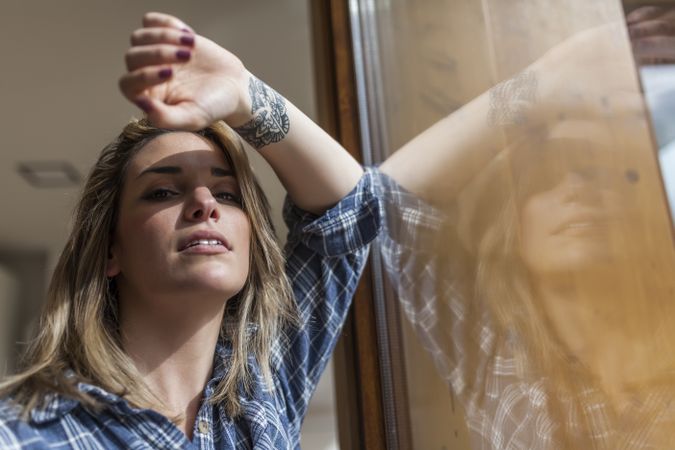 Woman at home looking at the camera