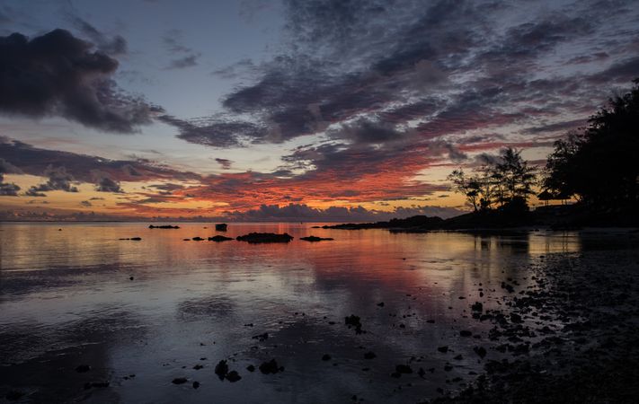 Colorful sunrise on a dark morning in Mauritius