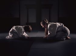 Krav Maga trainer and disciple bowing together
