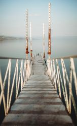 Rusty pier near calm sea