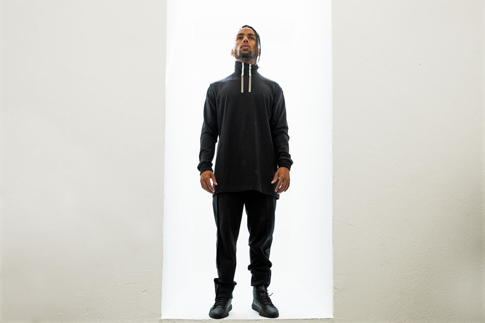 Dancing Black male with braids