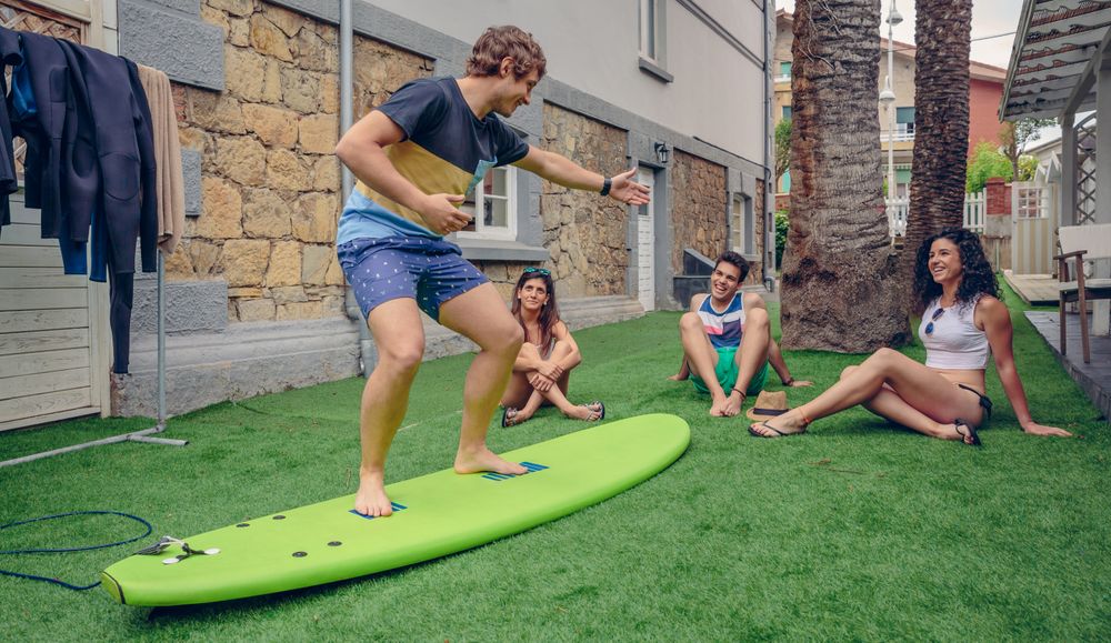 Group of friends in surf class
