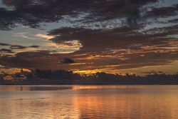 Beautiful colorful sky reflected in the Indian Ocean