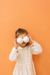 Cute little girl with Easter eggs
