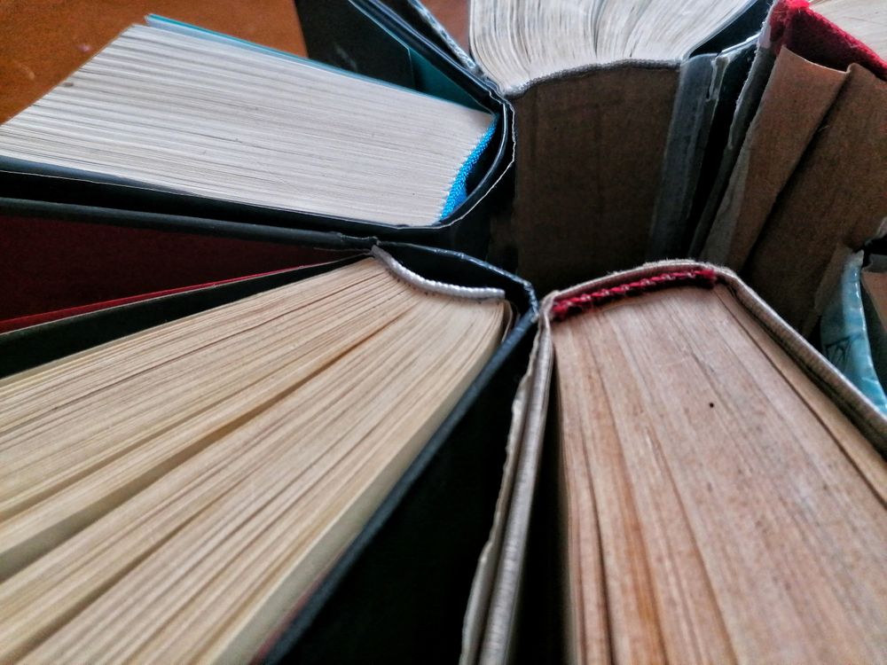 Books on wooden table in close-up