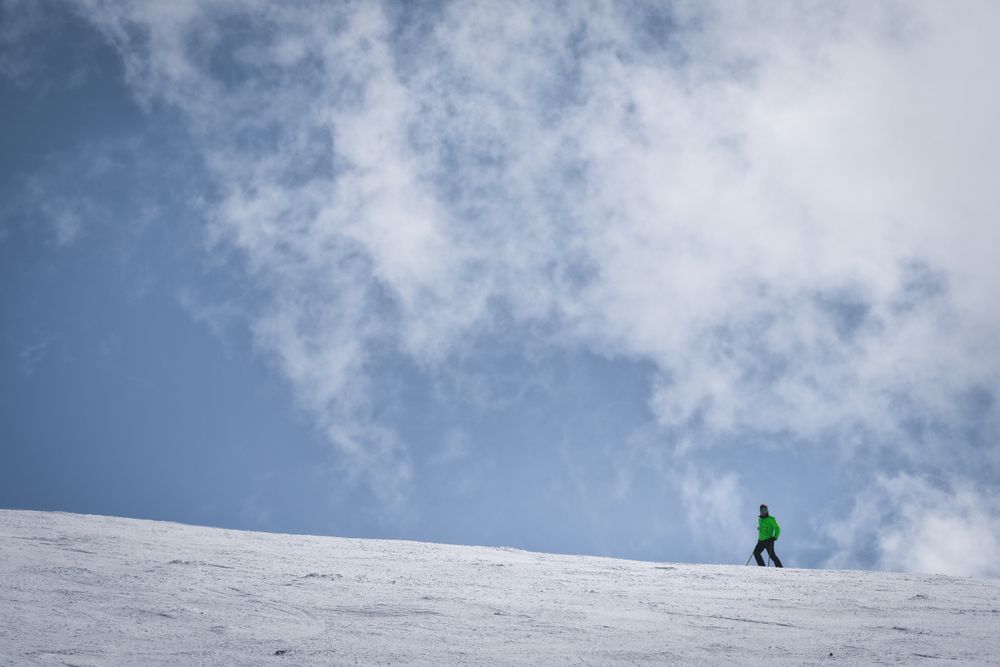 Man skiing on winter day