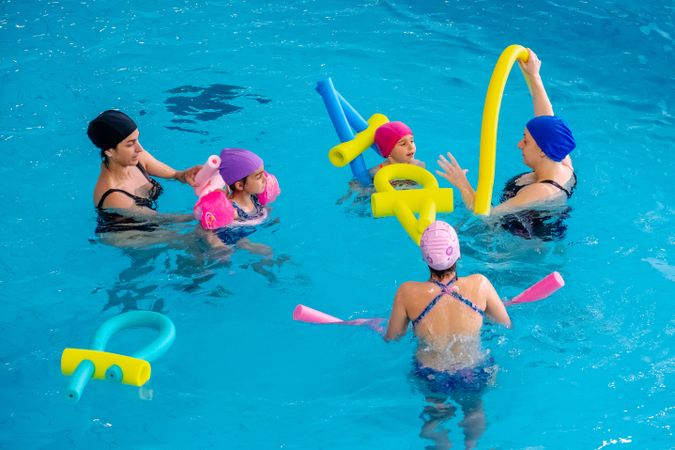 Women and girls in swimming pool