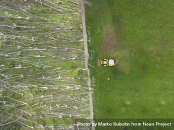 Bulldozer clearing out a forest, aerial view 43XYZb